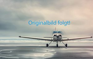 A small airplane is parked at TLAviation